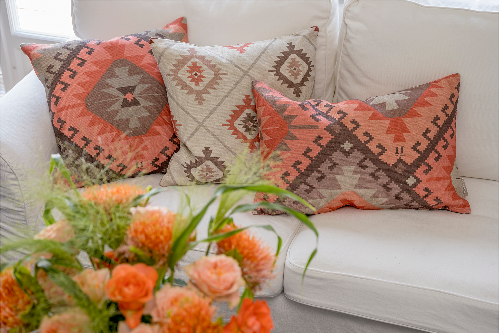 Orange patterned cushions deals
